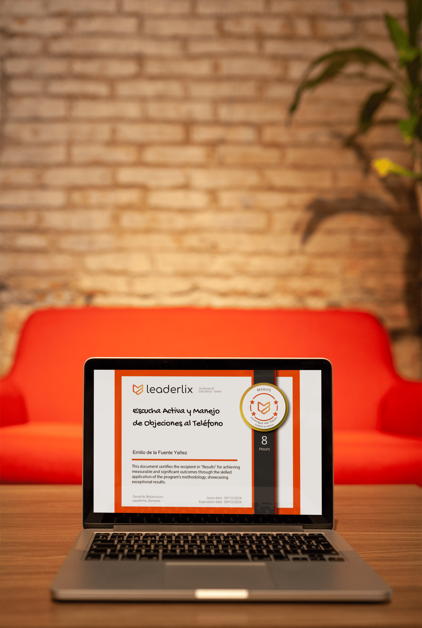 macbook-mockup-standing-on-a-wooden-table-against-a-red-sofa-a21001 (1)